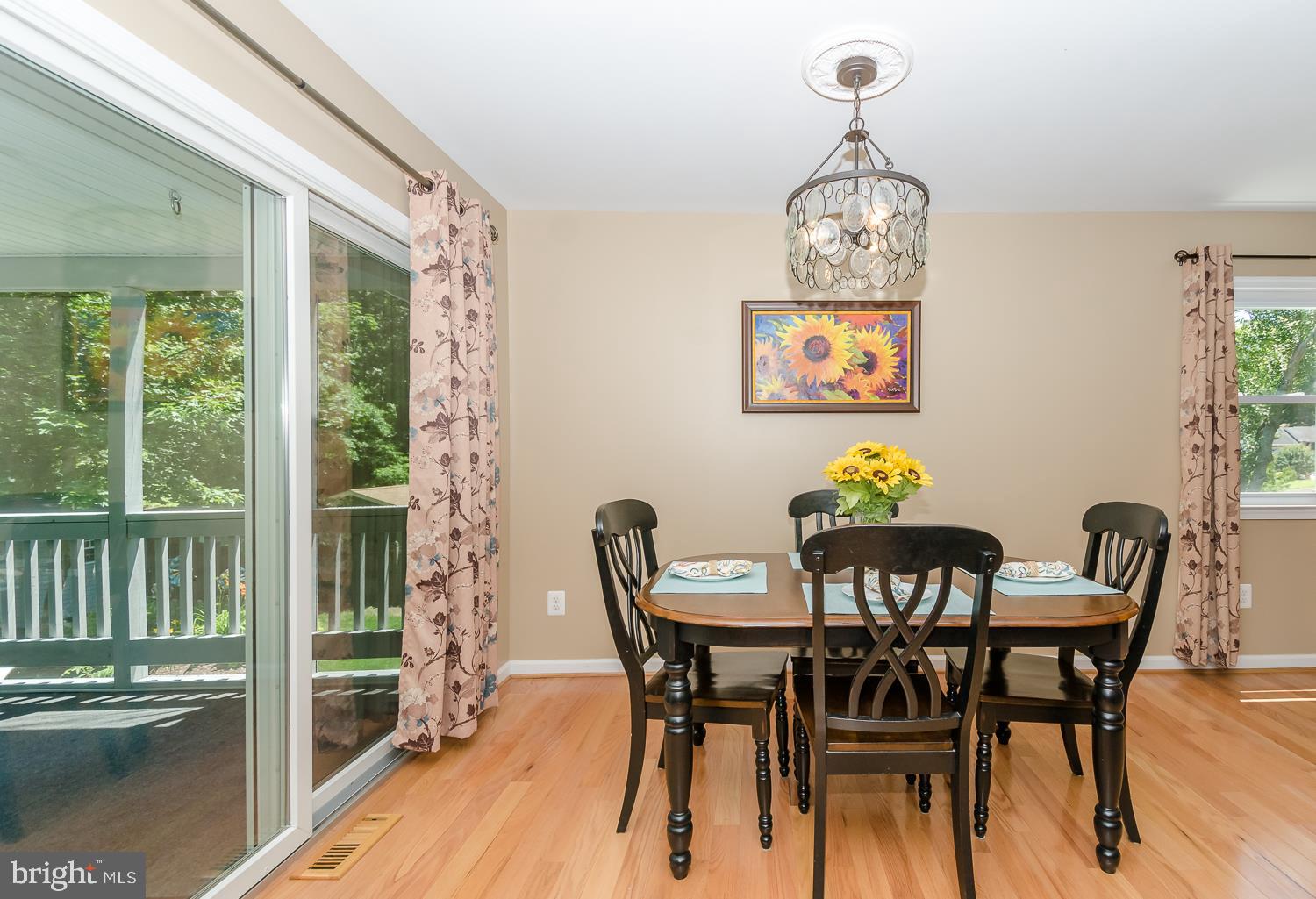 142 Circle Road Pasadena, MD 21122 - Photo 24 of 56 Dining Room with sliders to the enclosed porch!