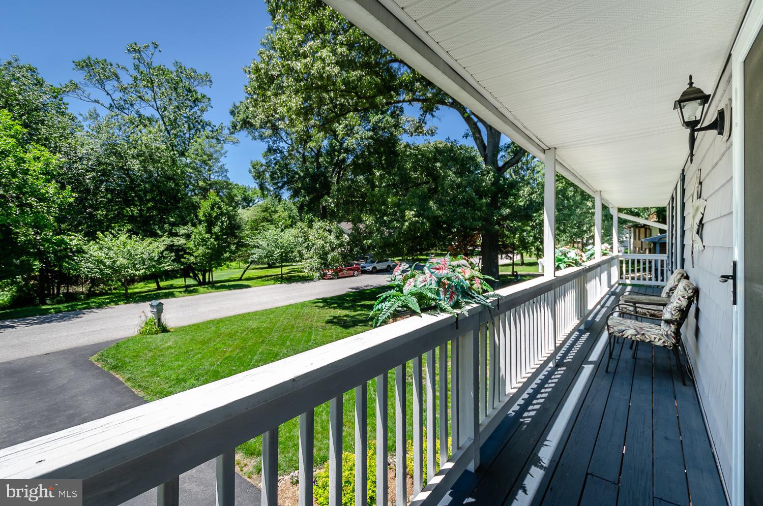 142 Circle Road Pasadena, MD 21122 - Photo 39 of 56 Balcony that runs along front of house!