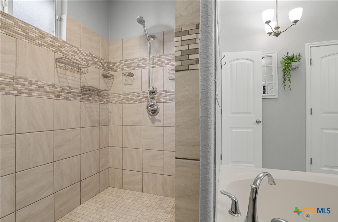 16017 Toby Court Temple, TX 76502 - Photo 16 of 33 a bathroom with a shower