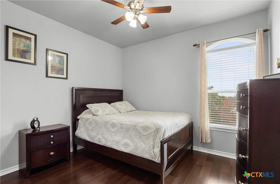 16017 Toby Court Temple, TX 76502 - Photo 21 of 33 a bedroom with a bed and a window