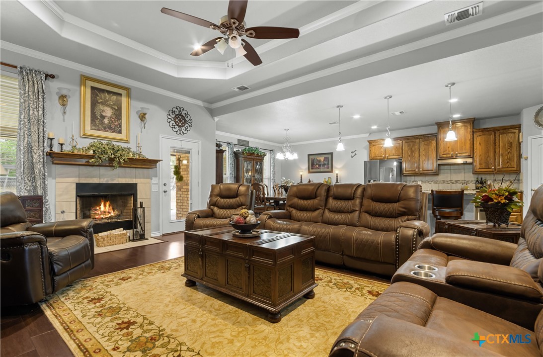 16017 Toby Court Temple, TX 76502 - Photo 4 of 33 a living room with furniture and a fireplace