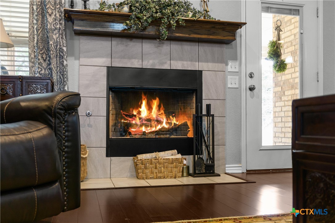 16017 Toby Court Temple, TX 76502 - Photo 6 of 33 a living room with furniture and a fireplace