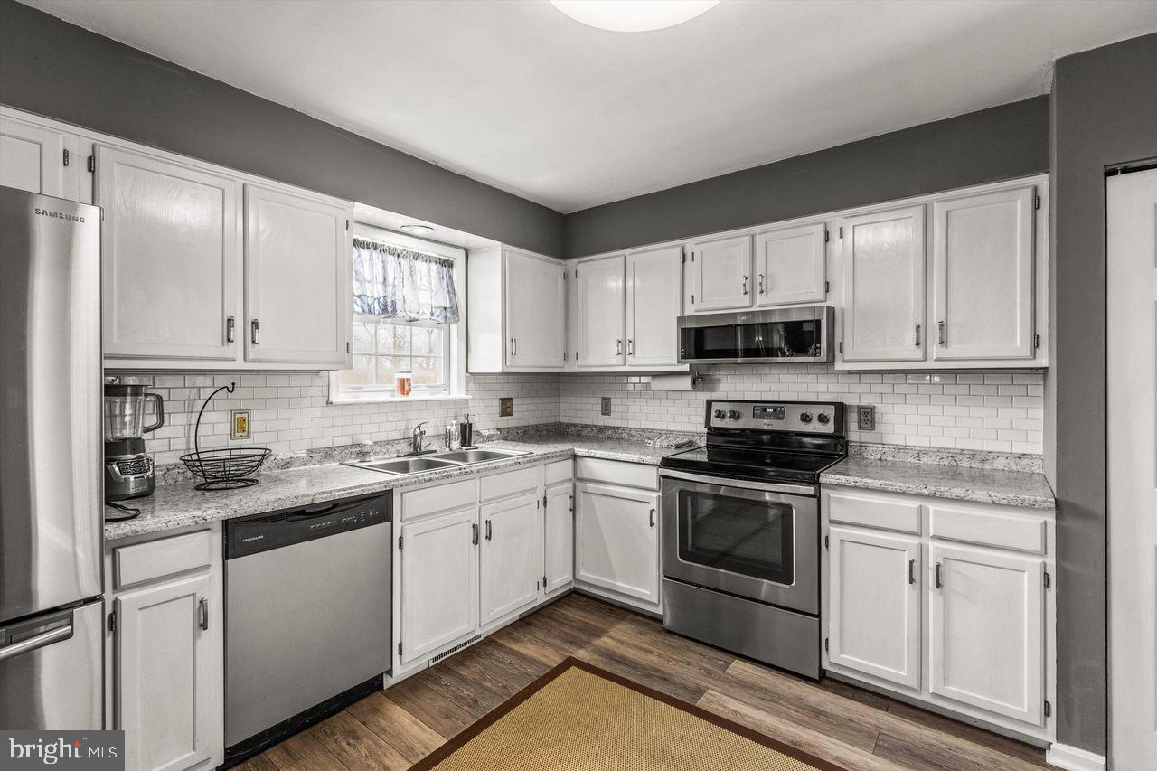 3051 Druck Valley Road York, PA 17406 - Photo 12 of 33 Modern kitchen with sleek finishes.