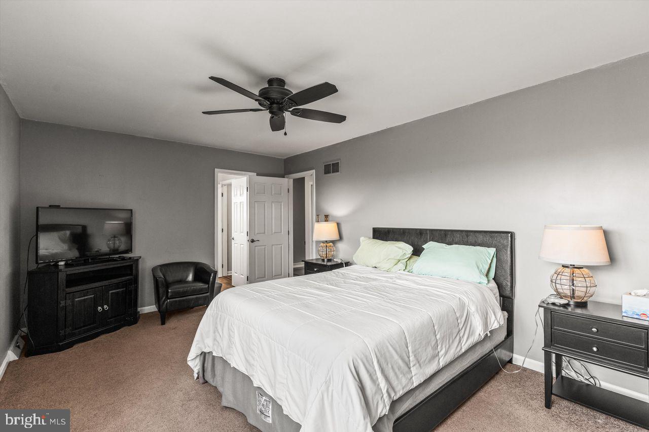 3051 Druck Valley Road York, PA 17406 - Photo 17 of 33 Serene bedroom with modern touches.