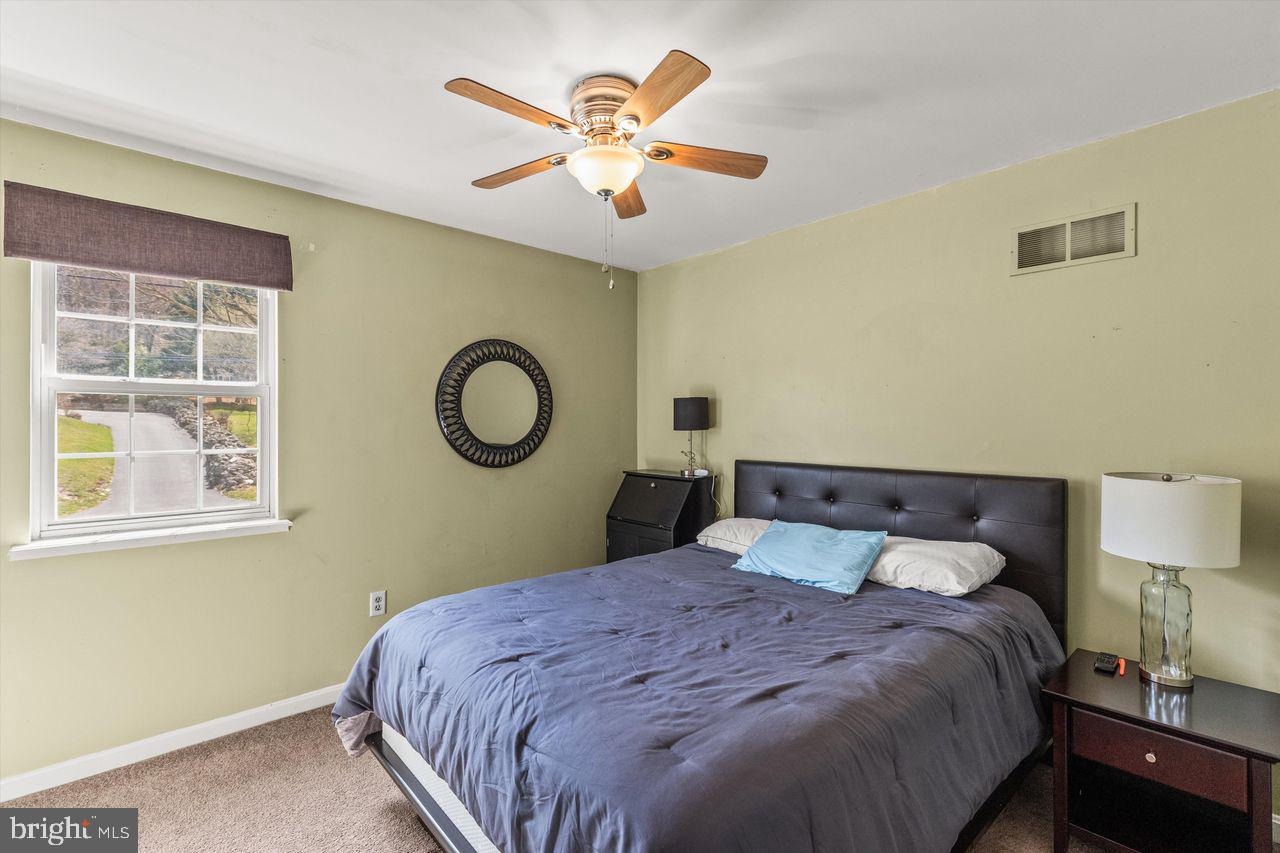 3051 Druck Valley Road York, PA 17406 - Photo 18 of 33 Cozy bedroom with natural light.