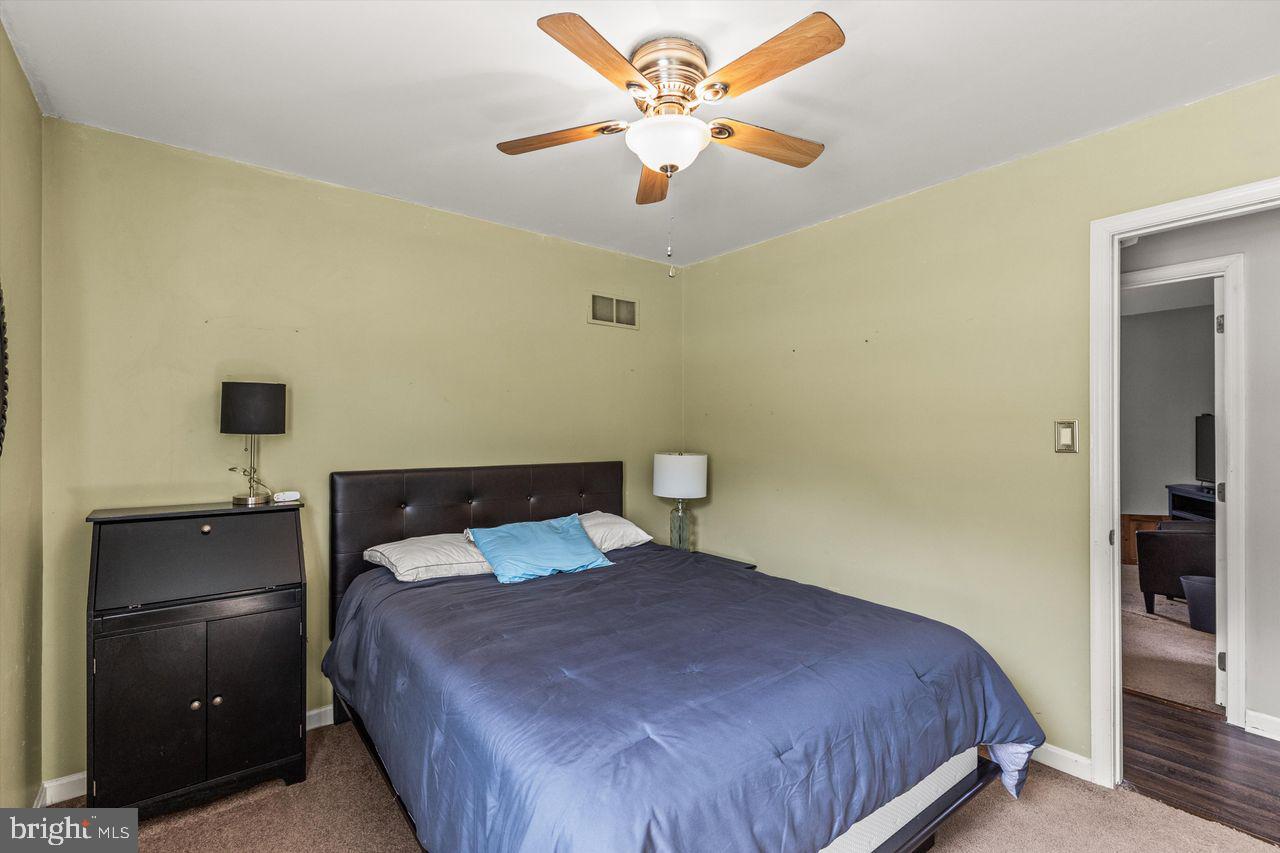 3051 Druck Valley Road York, PA 17406 - Photo 19 of 33 Cozy bedroom with modern charm.