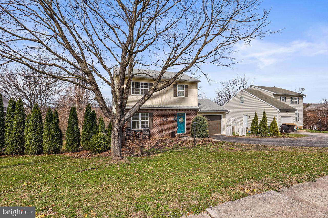 3051 Druck Valley Road York, PA 17406 - Photo 3 of 33 Charming home with lush greenery.