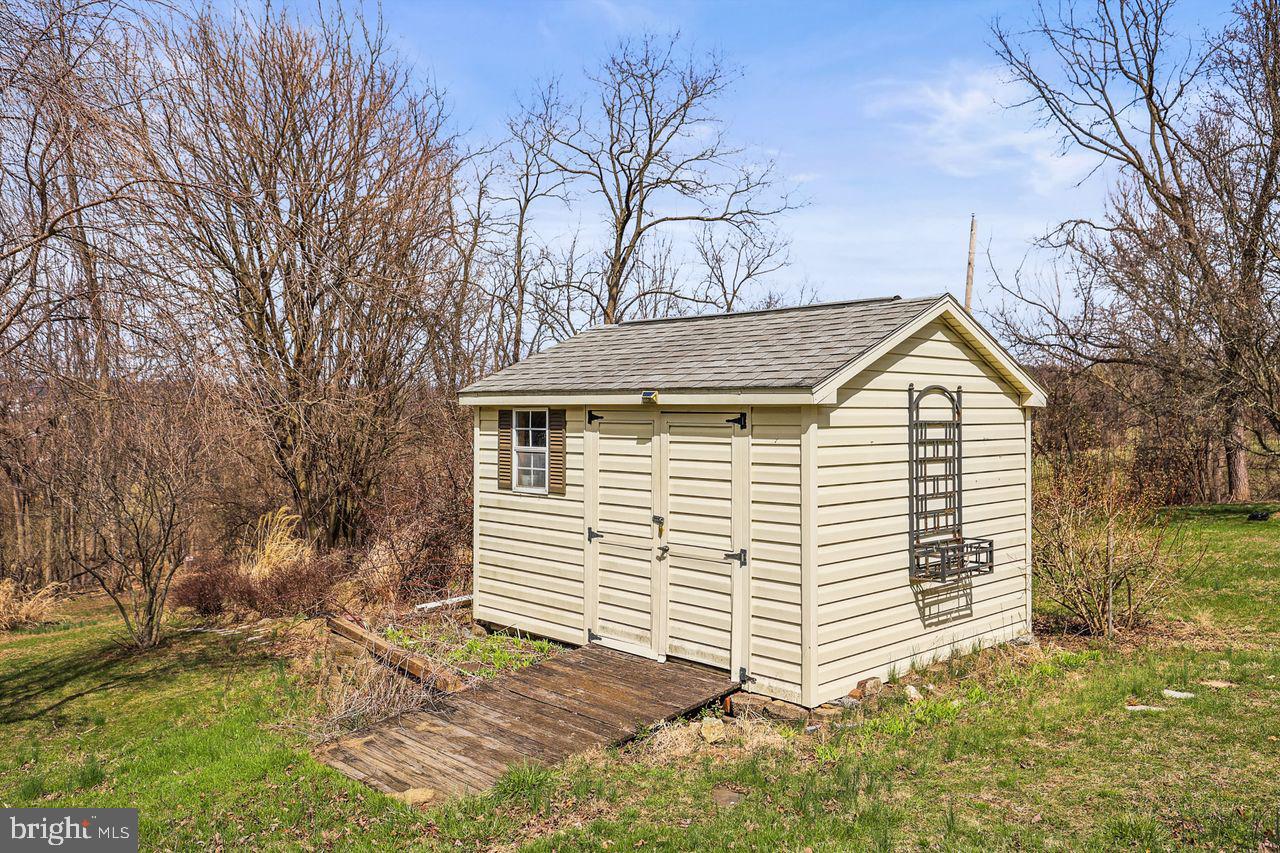 3051 Druck Valley Road York, PA 17406 - Photo 33 of 33 Charming garden shed in serene setting.