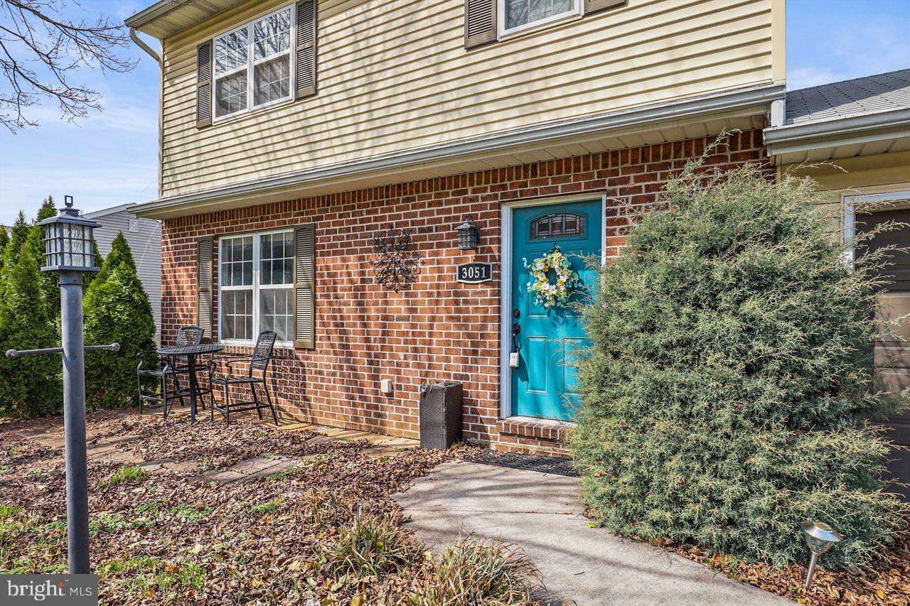 3051 Druck Valley Road York, PA 17406 - Photo 4 of 33 Charming brick facade with vibrant door.