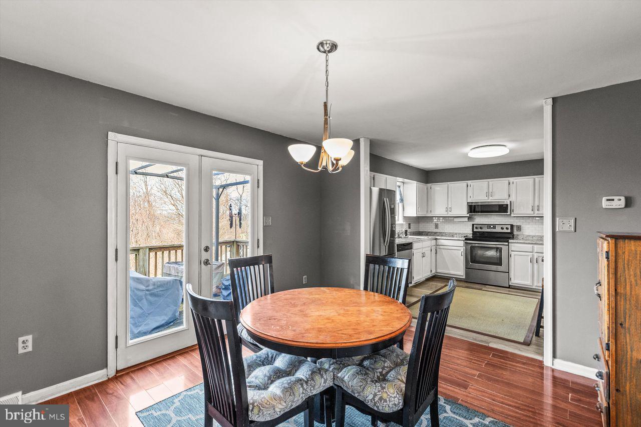3051 Druck Valley Road York, PA 17406 - Photo 9 of 33 Bright dining area with outdoor access.