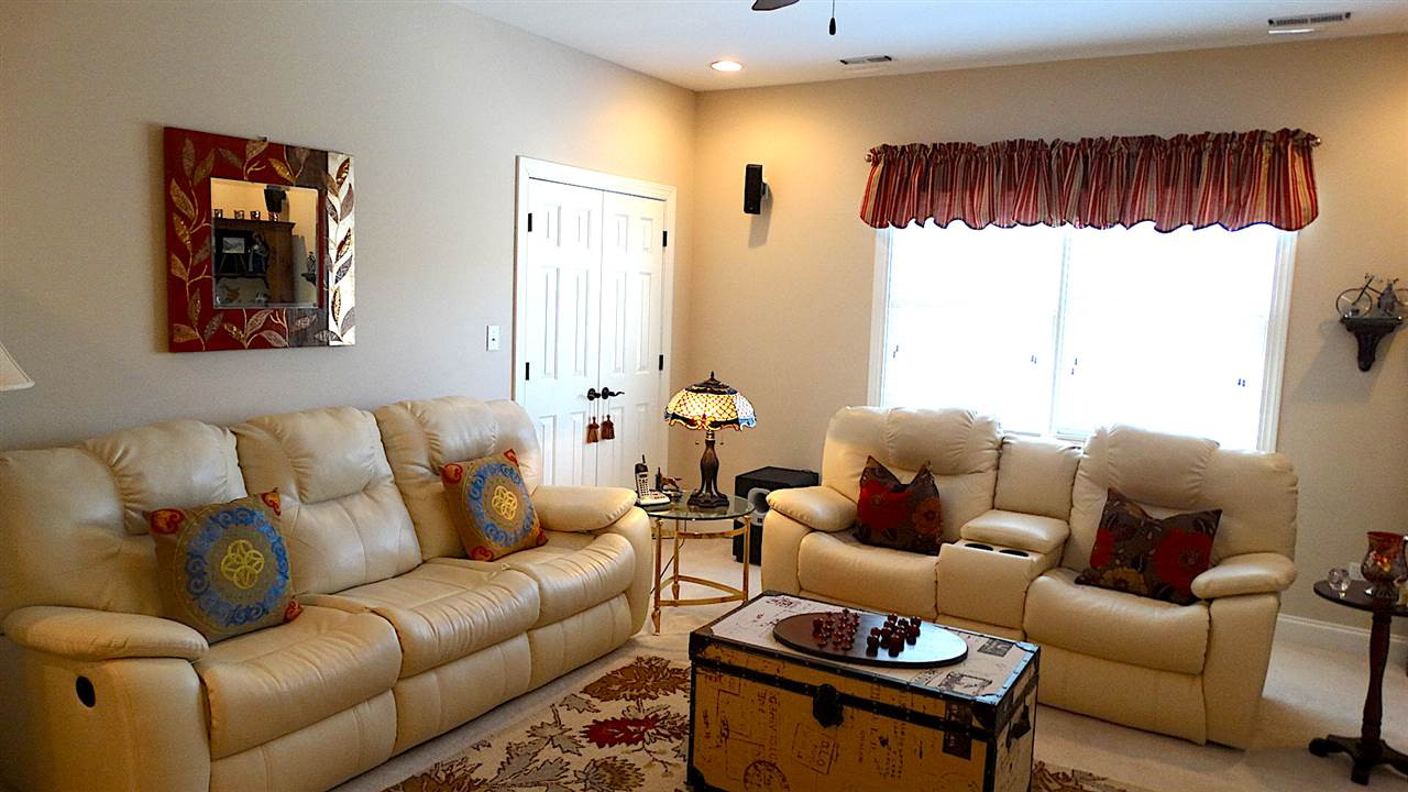 10335 Evergreen Spring Place Raleigh, NC 27614 - Photo 18 of 25 Large Bonus Room has room for large furniture, and has an adjoining WALK-IN ATTIC. Bonus Room