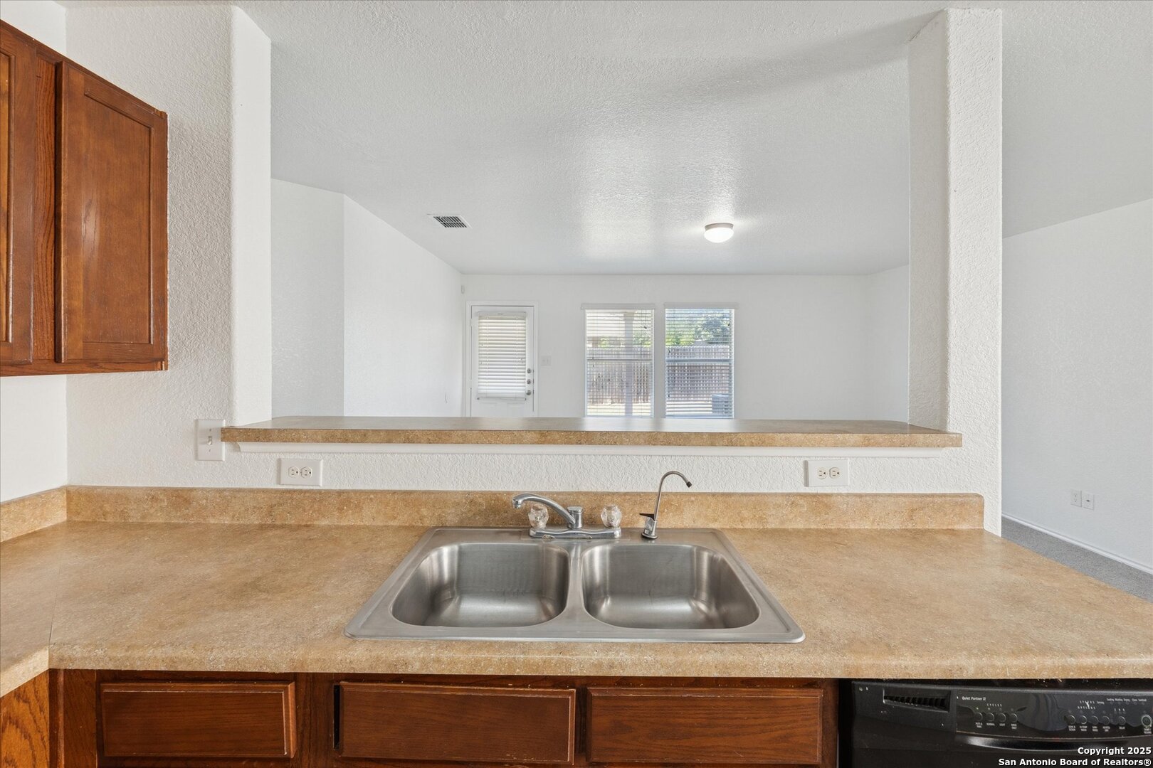9219 Hanover Cove Converse, TX 78109 - Photo 15 of 46 a bathroom with a sink and a mirror