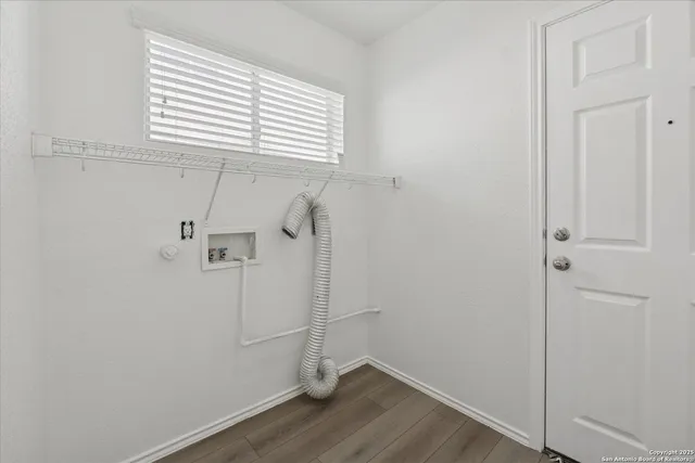 a view of a room that has a window in it