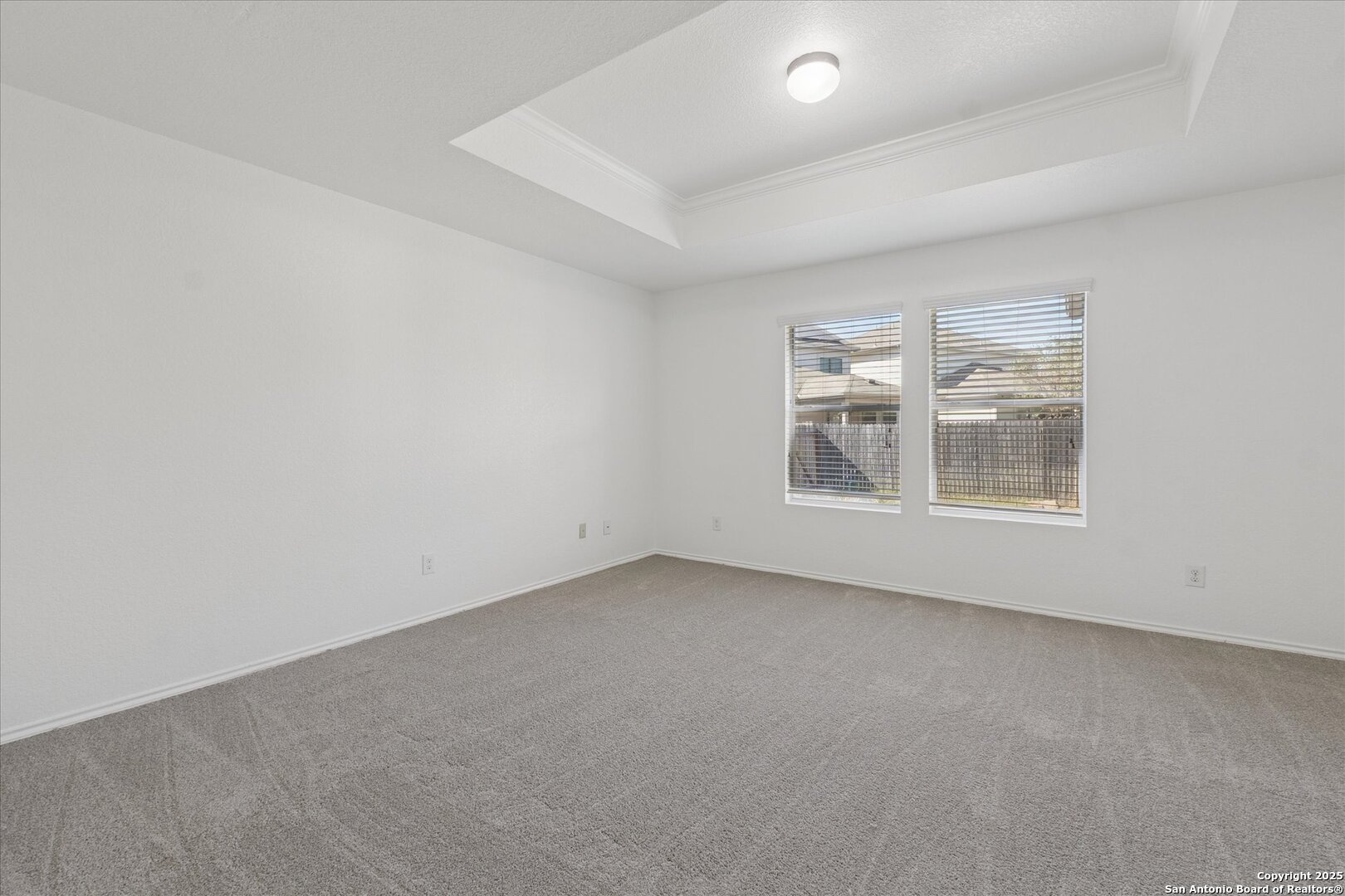 9219 Hanover Cove Converse, TX 78109 - Photo 20 of 46 an empty room with windows