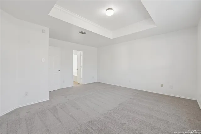 an empty room with an entryway