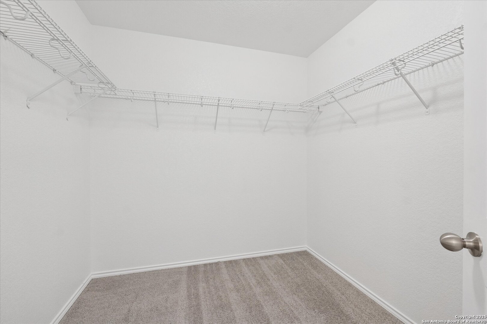 9219 Hanover Cove Converse, TX 78109 - Photo 25 of 46 a view of a room with racks on the wall