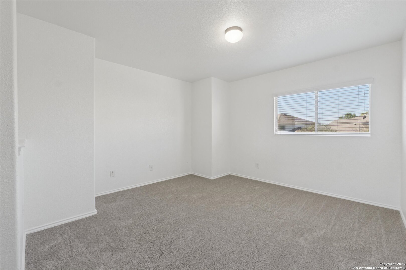 9219 Hanover Cove Converse, TX 78109 - Photo 36 of 46 an empty room with a empty space and a window
