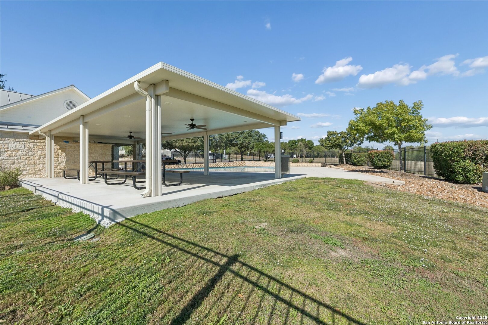 9219 Hanover Cove Converse, TX 78109 - Photo 40 of 46 a swimming pool with yard in front of it