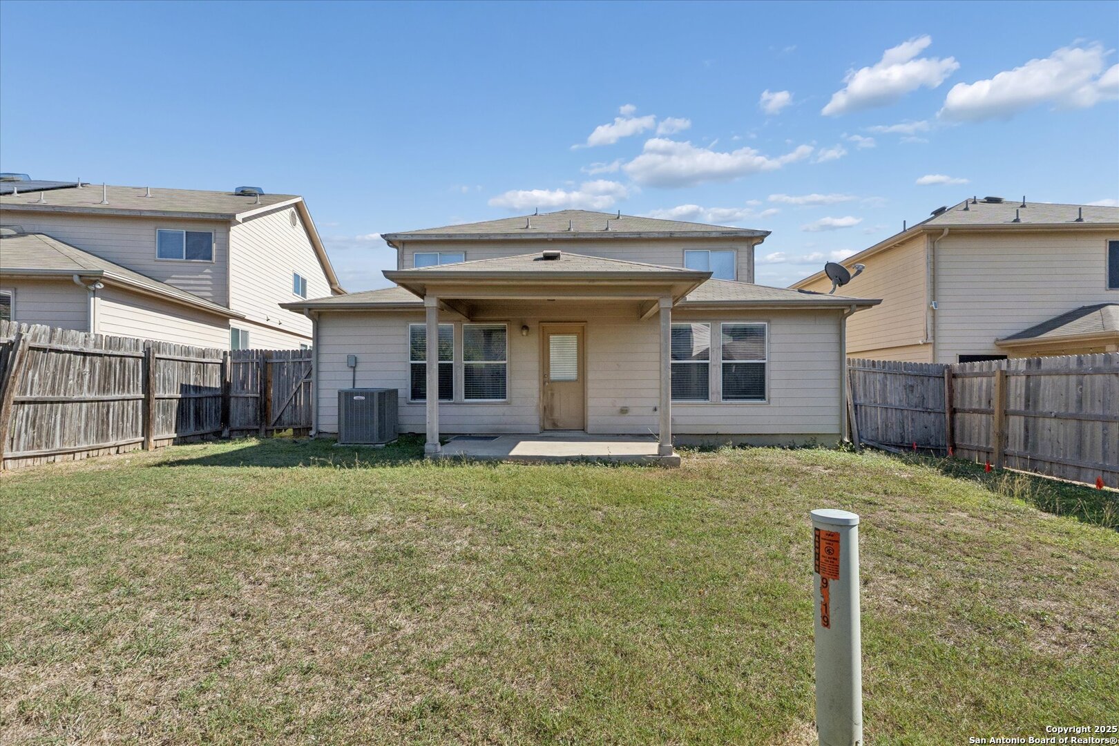 9219 Hanover Cove Converse, TX 78109 - Photo 42 of 46 a backyard of a house with table and chairs