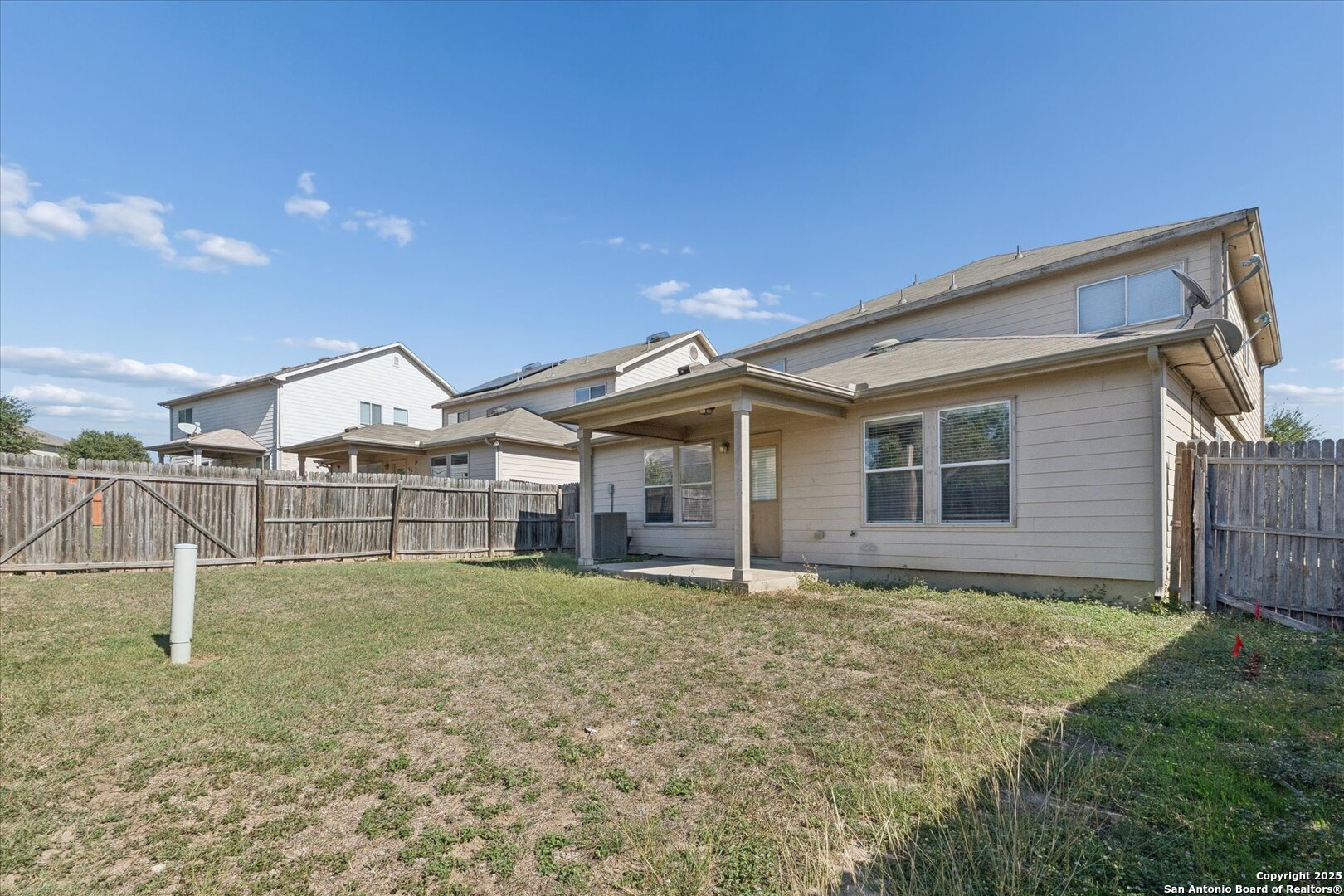 9219 Hanover Cove Converse, TX 78109 - Photo 43 of 46 a view of a house with a yard and sitting area