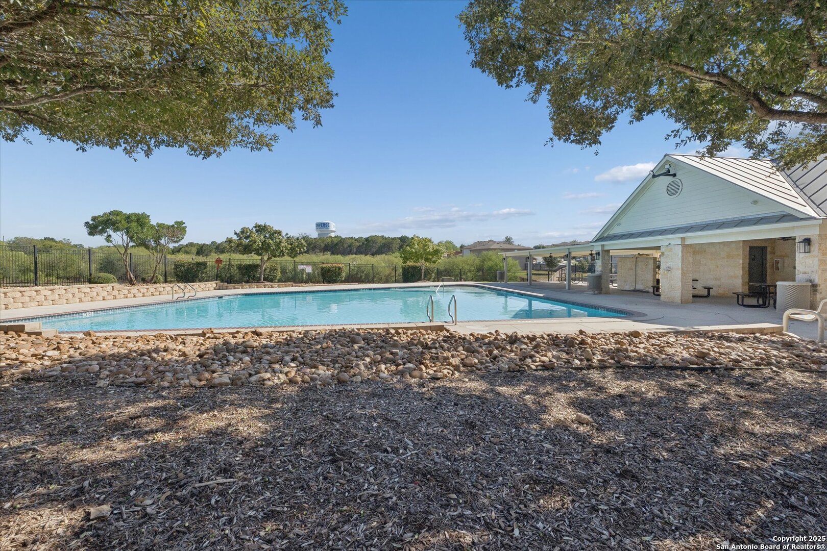 9219 Hanover Cove Converse, TX 78109 - Photo 45 of 46 a view of a house with a yard and a large tree