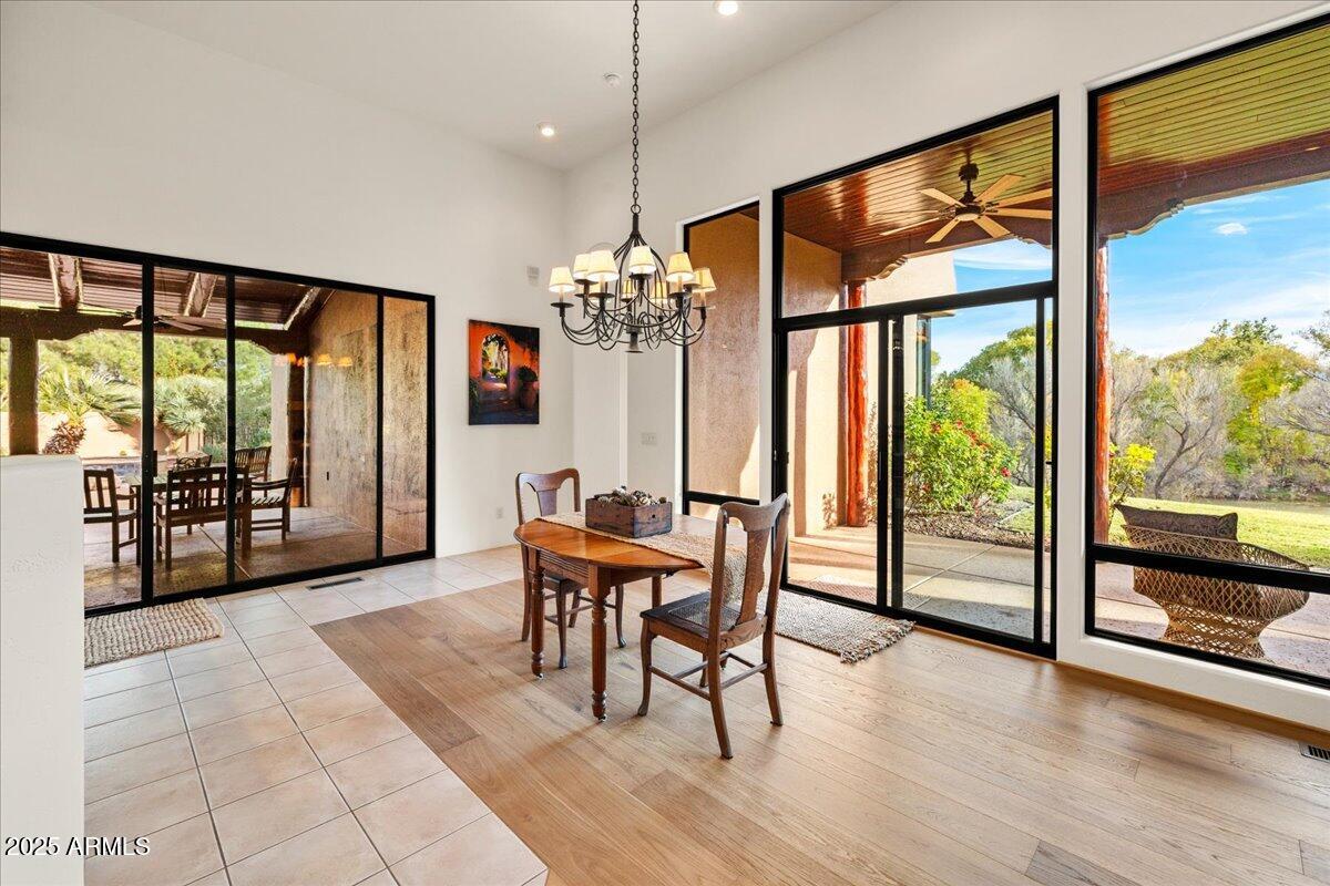 1575 Rio Verde Lane Camp Verde, AZ 86322 - Photo 13 of 57 a view of a dining room with furniture window and wooden floor