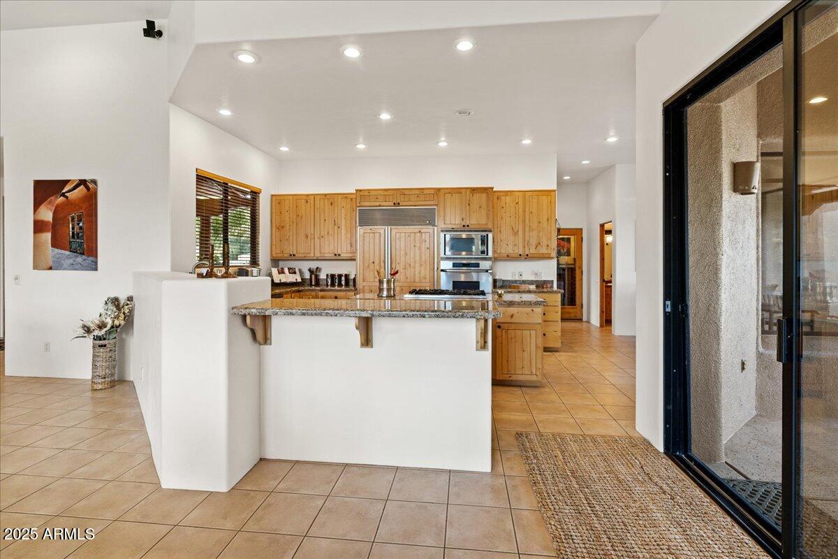 1575 Rio Verde Lane Camp Verde, AZ 86322 - Photo 15 of 57 a view of living room with stainless steel appliances granite countertop cabinets and a couch