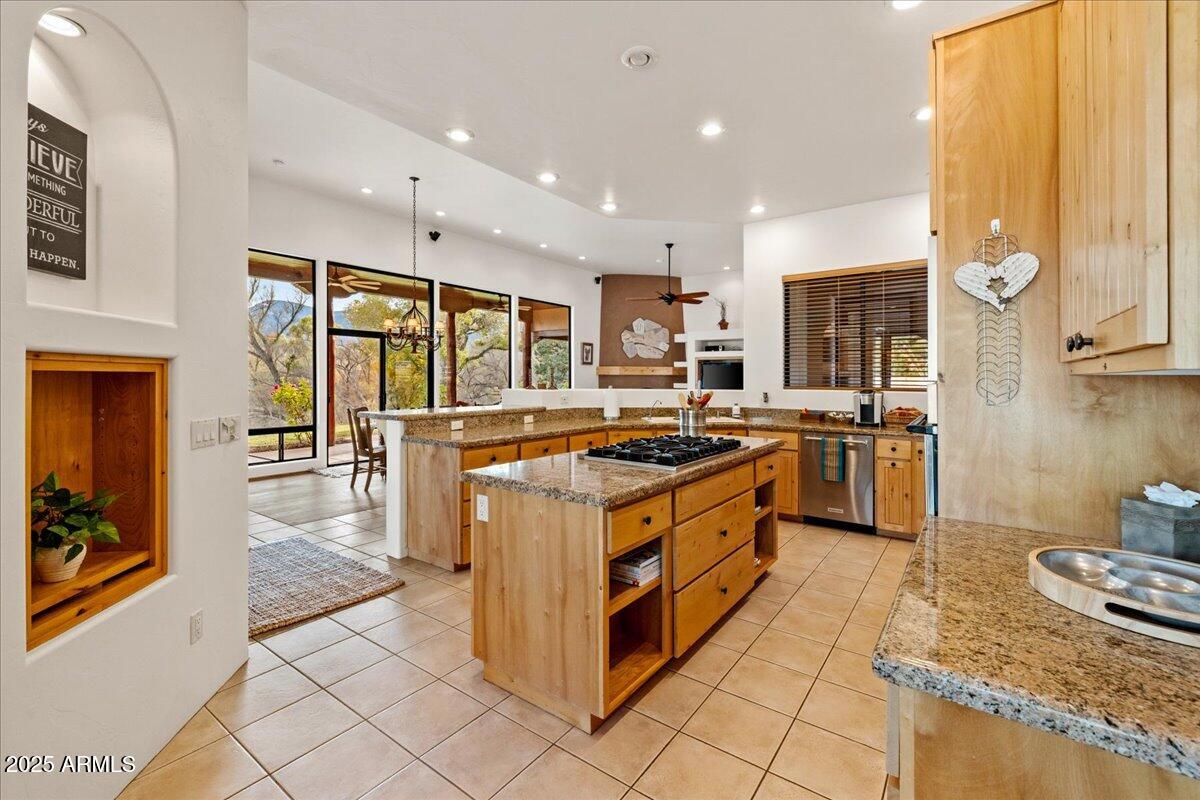1575 Rio Verde Lane Camp Verde, AZ 86322 - Photo 17 of 57 a kitchen with stainless steel appliances granite countertop a stove a sink and a refrigerator