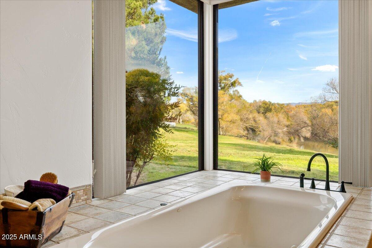 1575 Rio Verde Lane Camp Verde, AZ 86322 - Photo 27 of 57 a room with a bed and a window with outer view