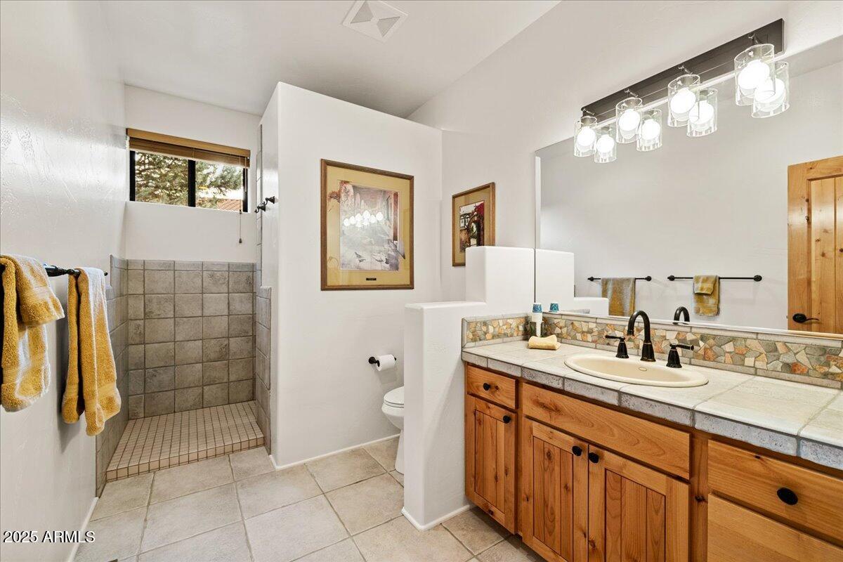 1575 Rio Verde Lane Camp Verde, AZ 86322 - Photo 33 of 57 a bathroom with a sink a vanity and a mirror