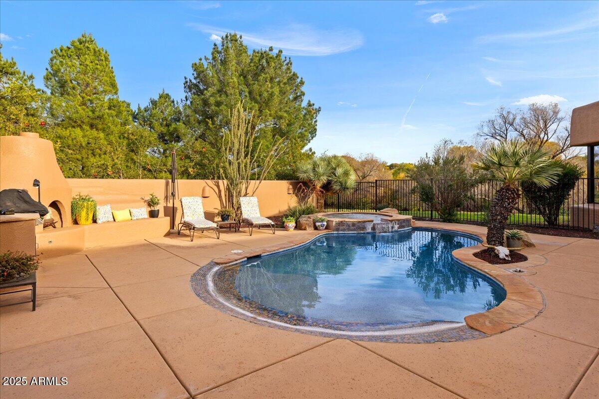 1575 Rio Verde Lane Camp Verde, AZ 86322 - Photo 41 of 57 a view of a swimming pool with a patio
