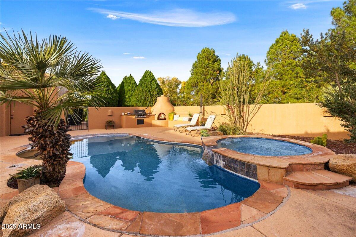 1575 Rio Verde Lane Camp Verde, AZ 86322 - Photo 43 of 57 a view of a swimming pool with an outdoor seating