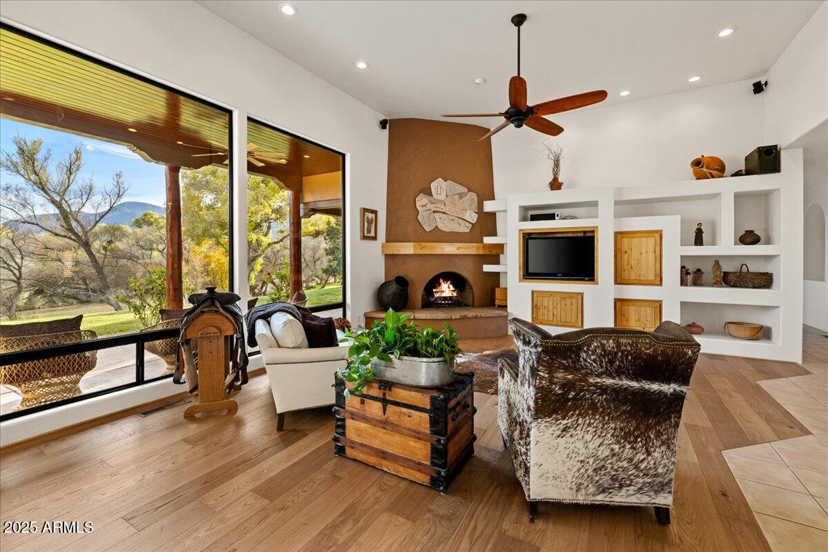 1575 Rio Verde Lane Camp Verde, AZ 86322 - Photo 10 of 57 a living room with furniture fireplace and flat screen tv