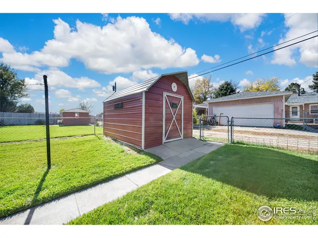 a view of a backyard with a garden