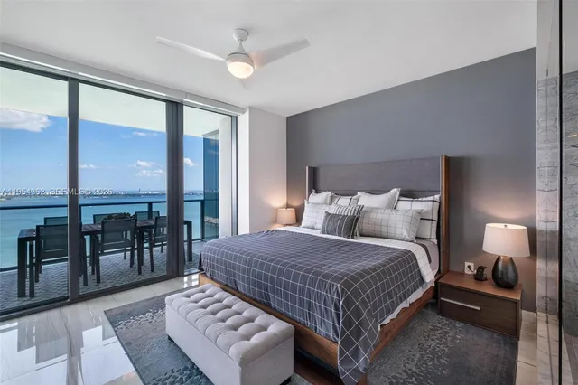 a balcony with furniture and a view