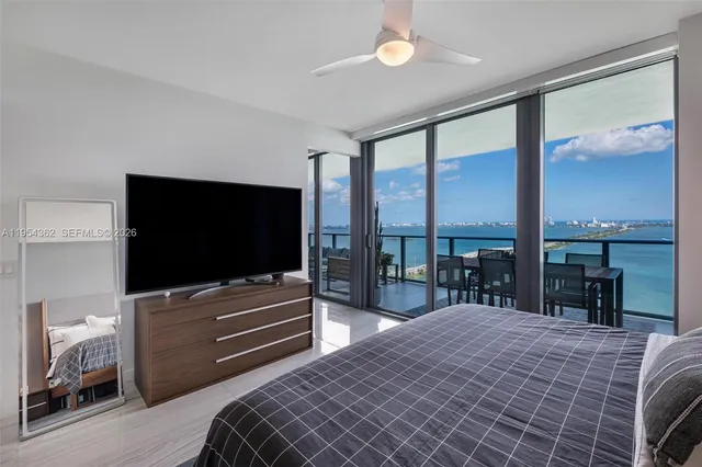 a view of swimming pool with outdoor seating and a couch