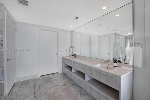 a view of a backyard with swimming pool