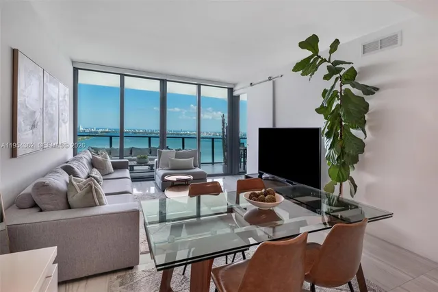 a view of swimming pool with seating space