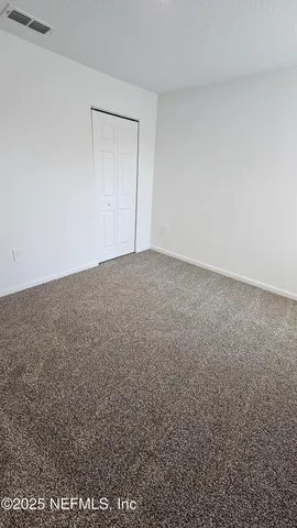 an empty room with a workbench