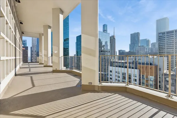 a view of balcony with city