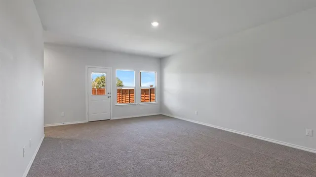 a view of kitchen with wooden floor