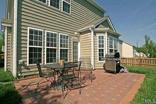 8345 Tie Stone Way Raleigh, NC 27613 - Photo 12 of 12 a patio with table and chairs