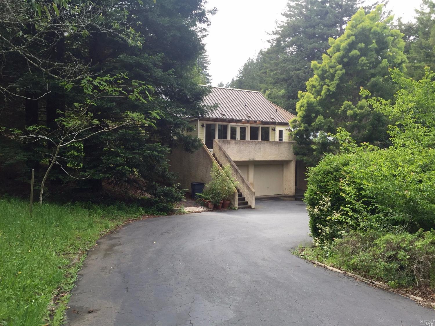 817 Jonive Road Sebastopol, CA 95472 - Photo 1 of 1 a front view of a house with a garden
