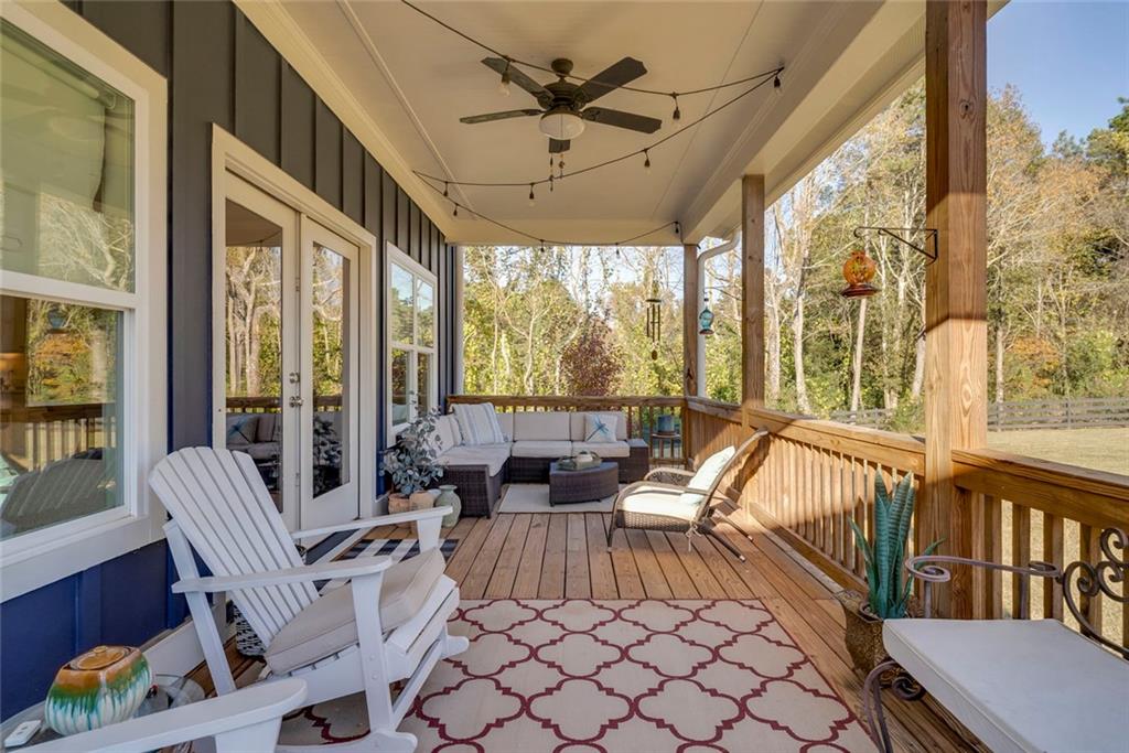 564 Old Airport Road Commerce, GA 30530 - Photo 18 of 39 a living room with furniture and a large window