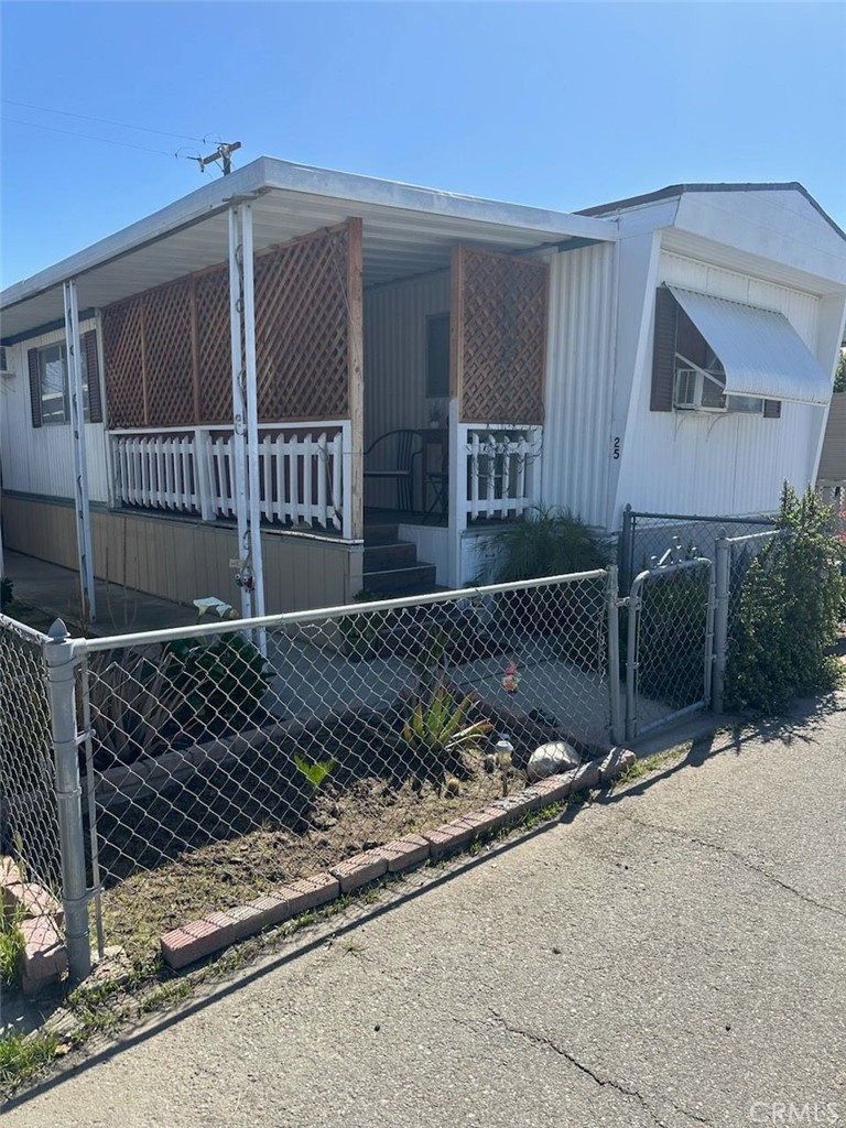 a front view of a house with garage