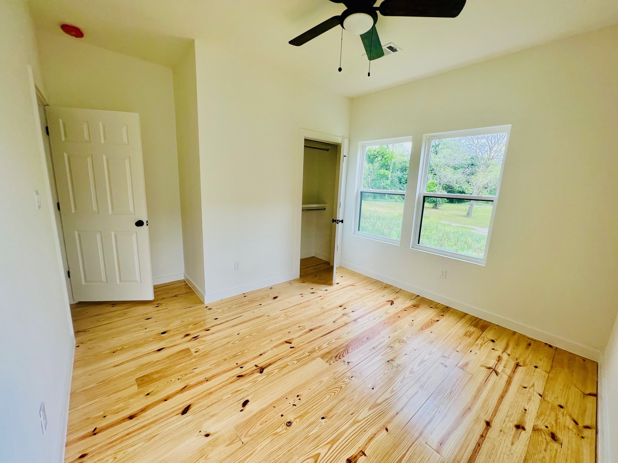 228 North Dixie Street Brenham, TX 77833 - Photo 6 of 10 a view of an empty room and window