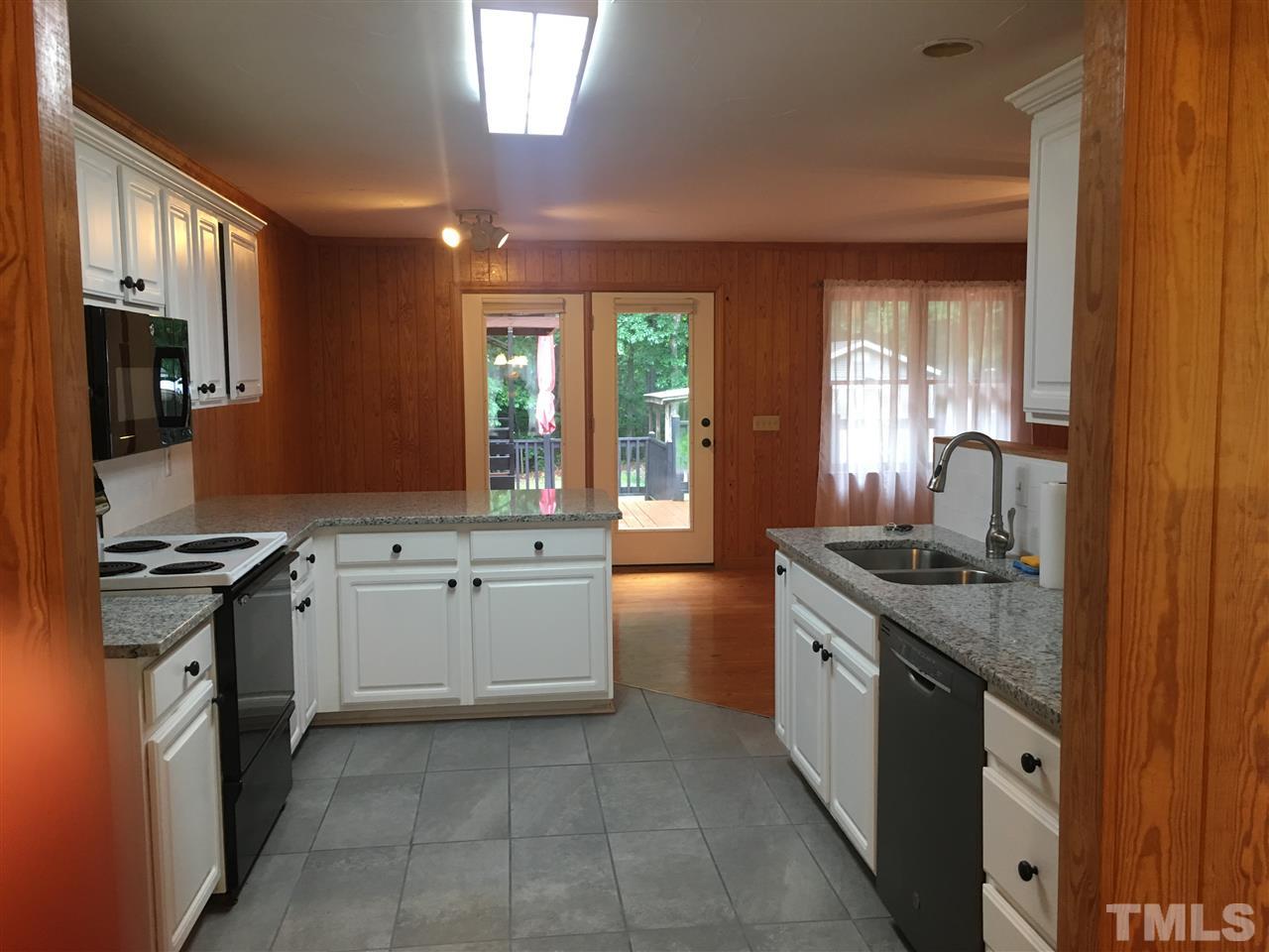 575 North Ridge Circle Roxboro, NC 27574 - Photo 4 of 16 Kitchen is open to the dining & family room.
