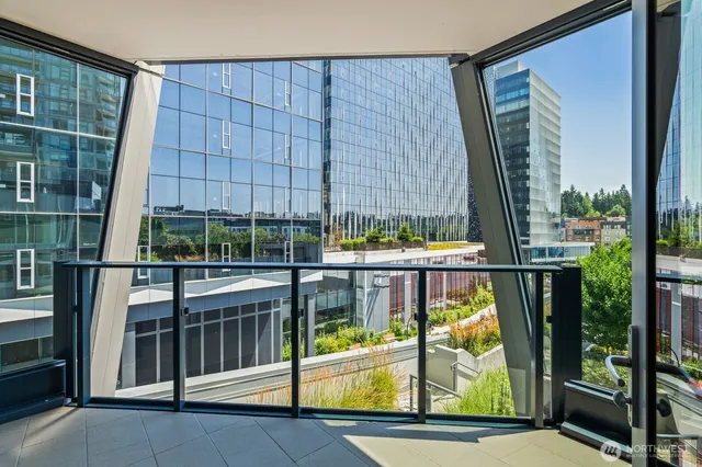 a view of balcony with a potted plant