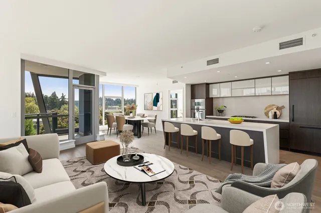 a living room with furniture and a table