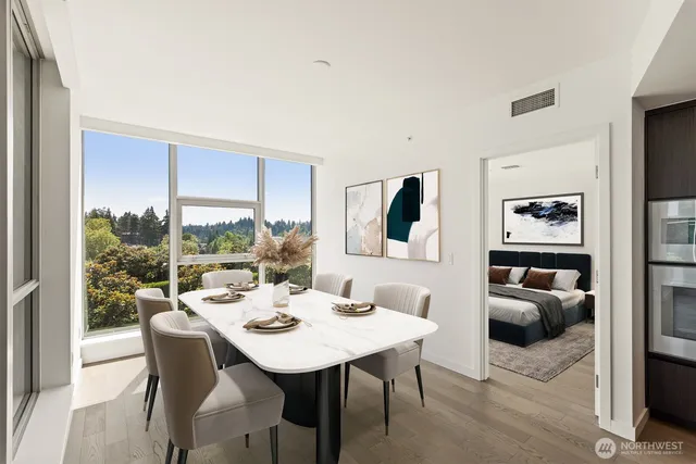 a view of a dining room with furniture window and outside view